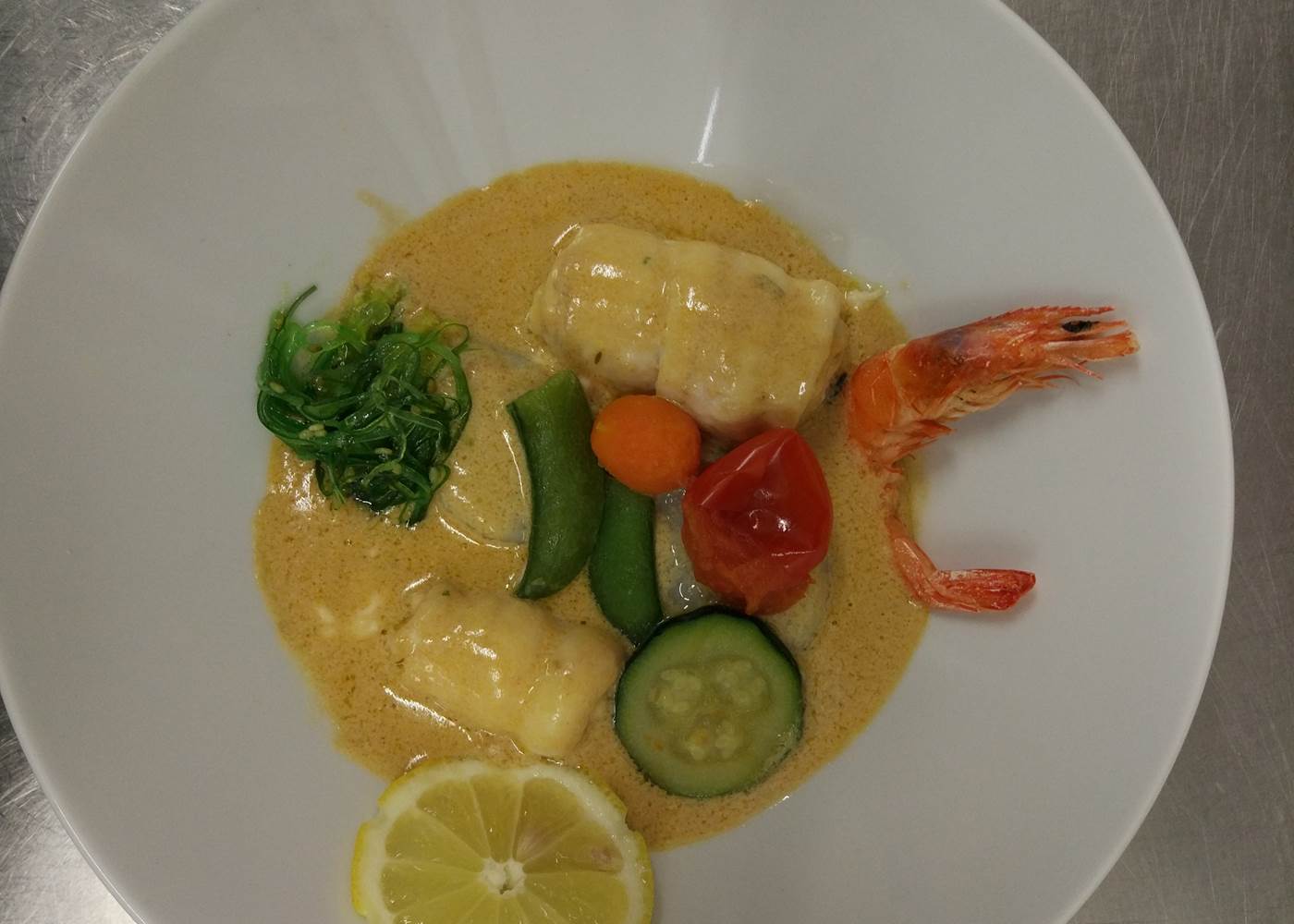 Nage de filets de sole aux petits légumes
