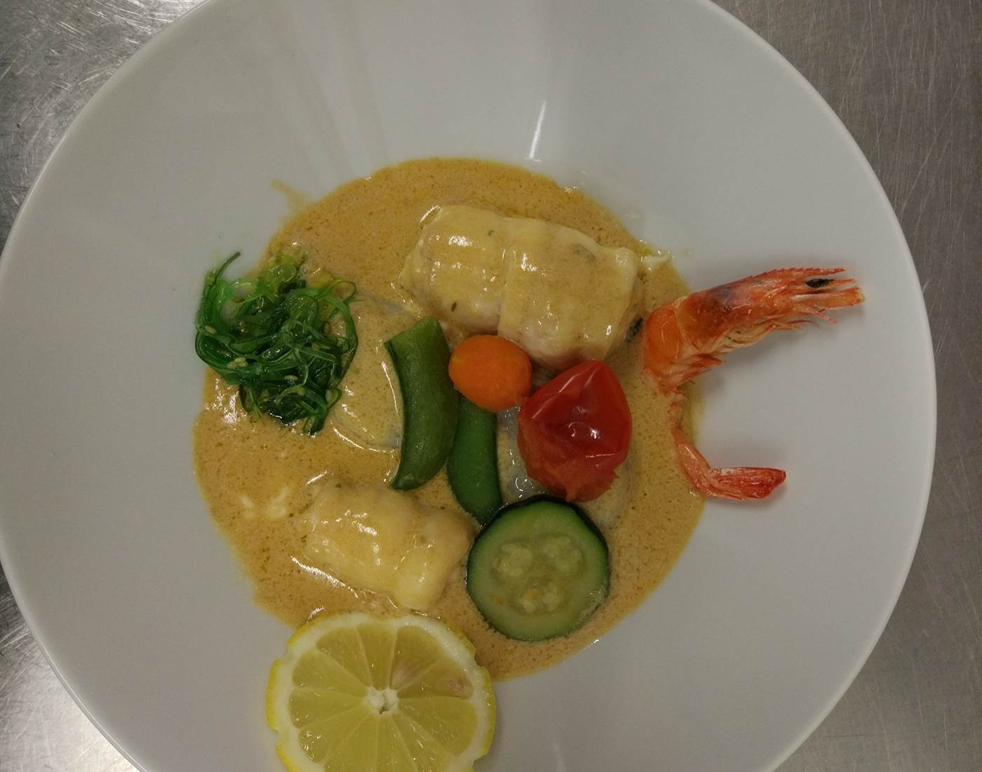 Nage de filets de sole aux petits légumes