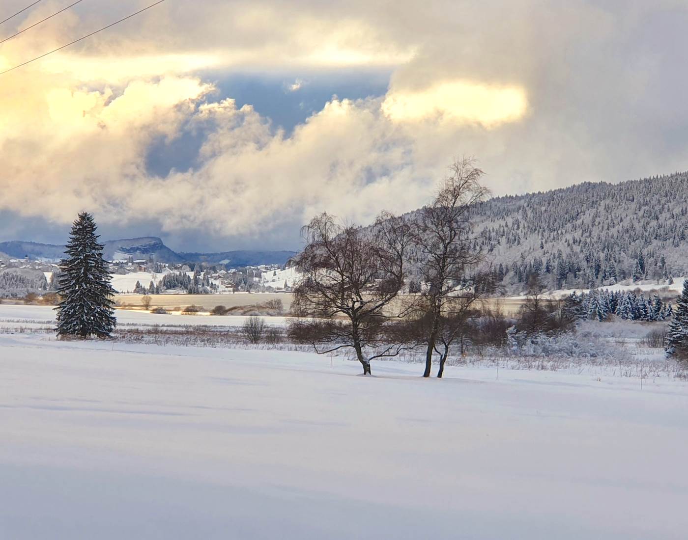 Skis aux pieds en direction des Rousses