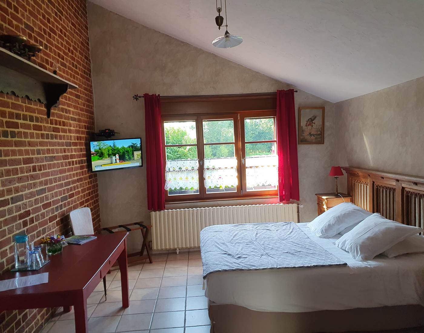 Vue sur le bocage et sur les ânes