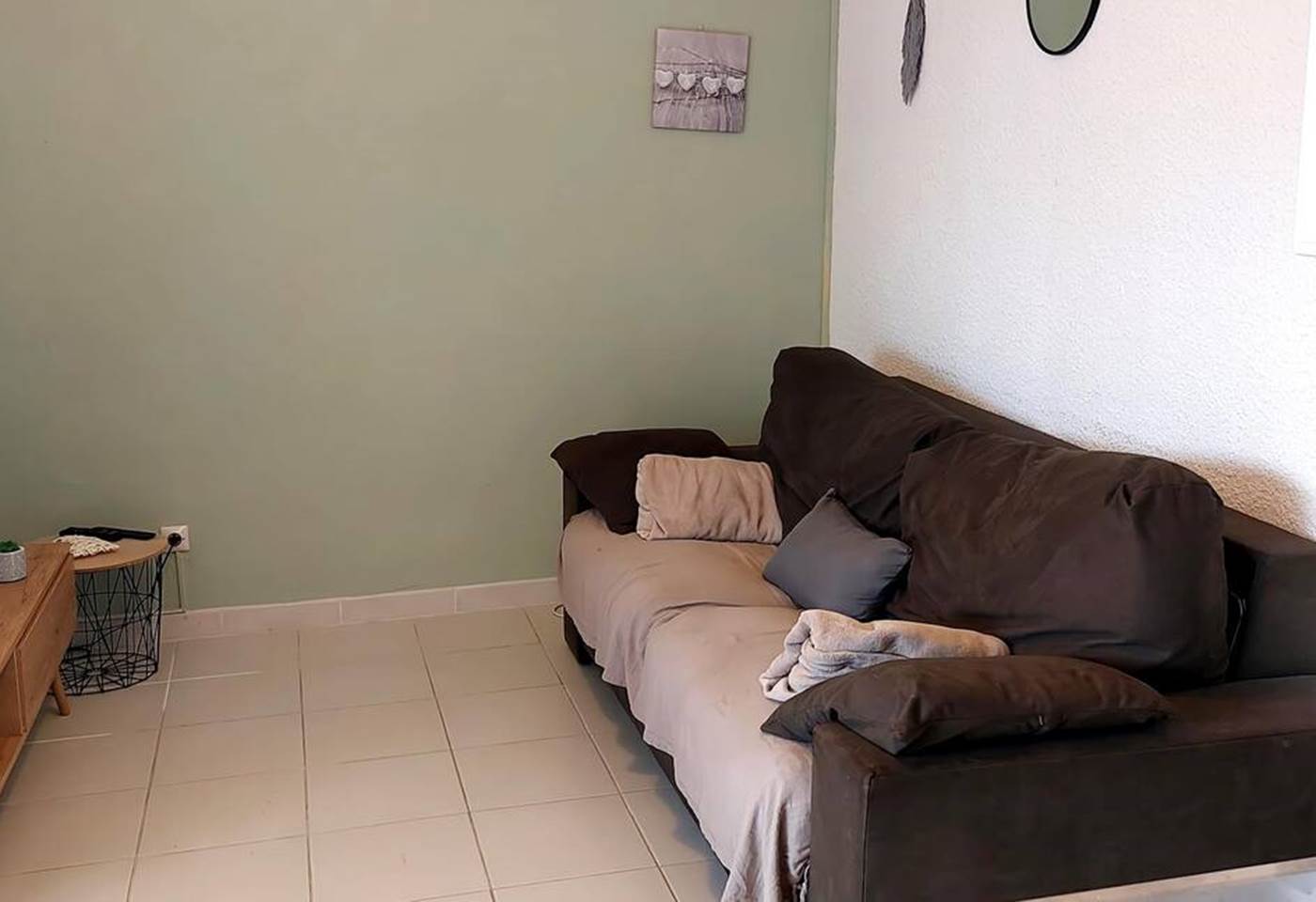 Salon avec canapé convertible