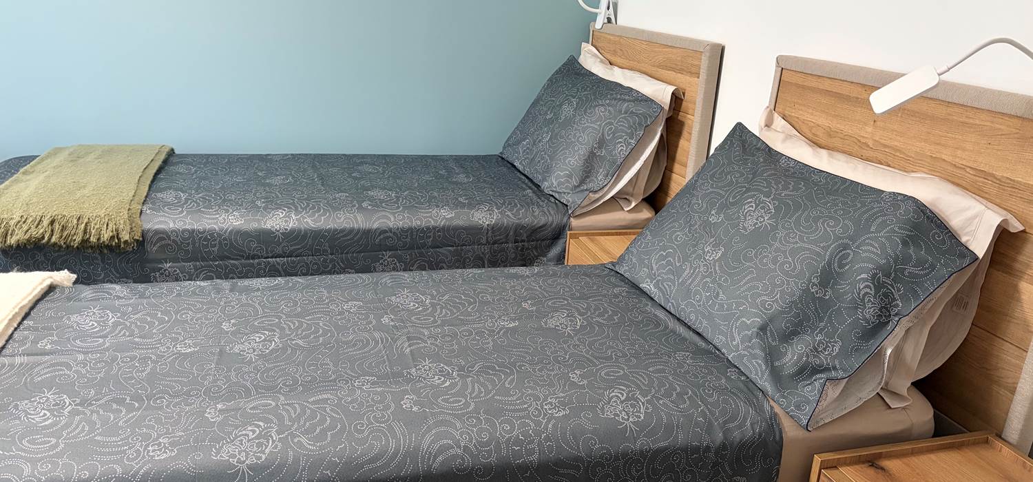 Chambre bleue lits séparés
