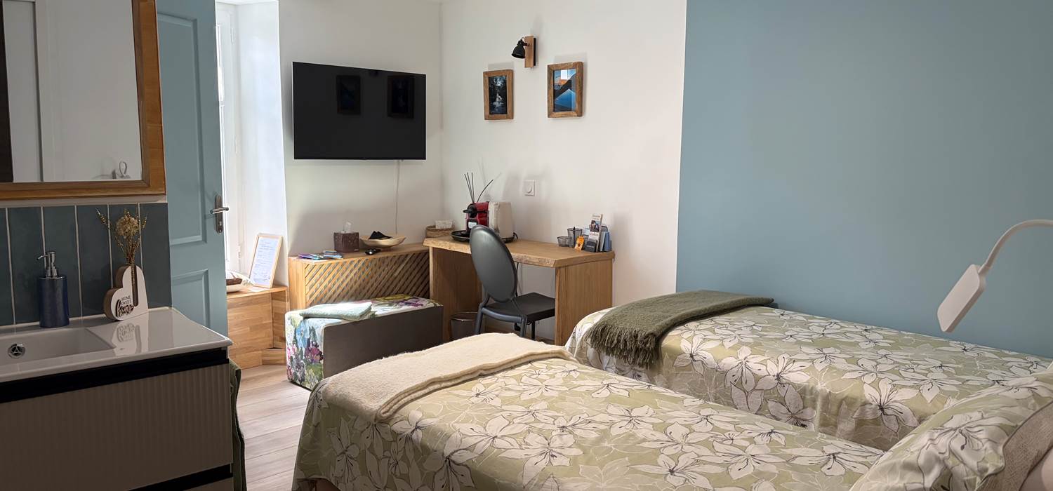Chambre bleue lits séparés
