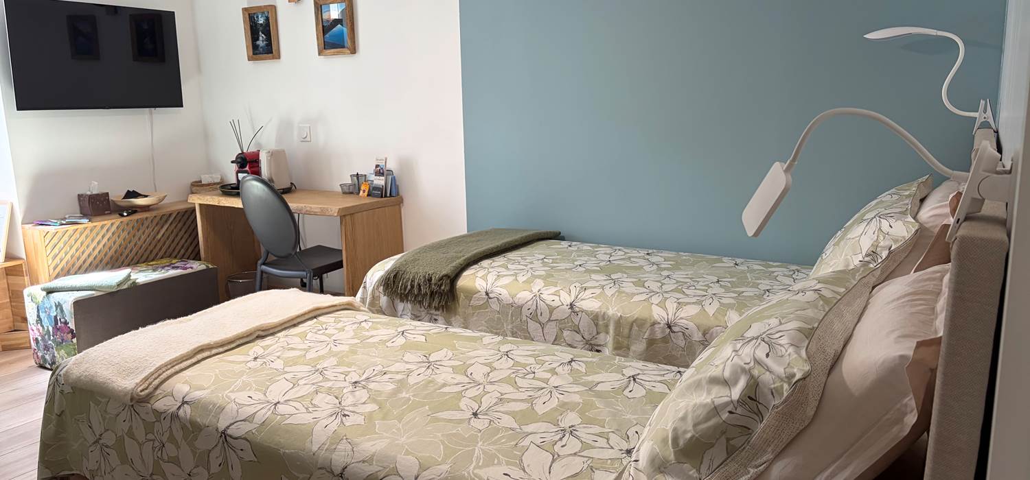 Chambre bleue lits séparés