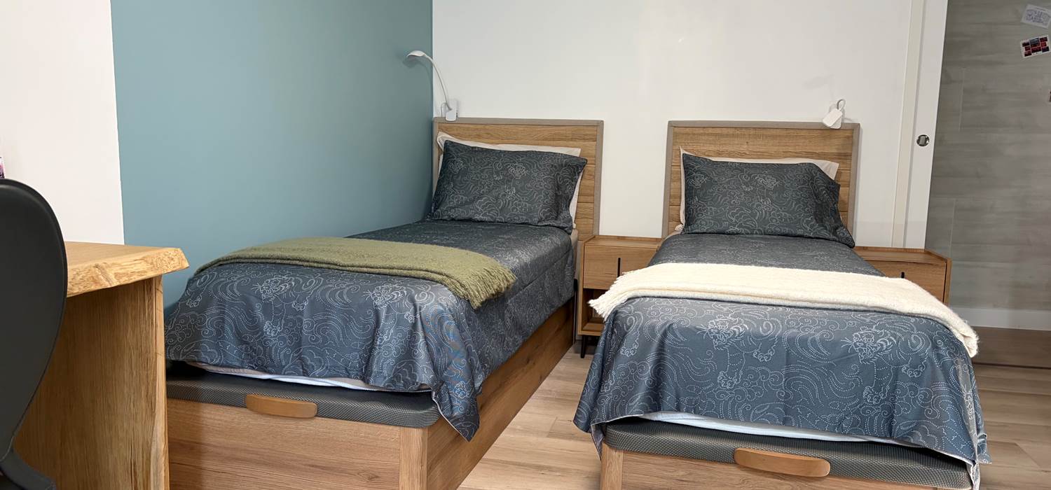 Chambre bleue lits séparés