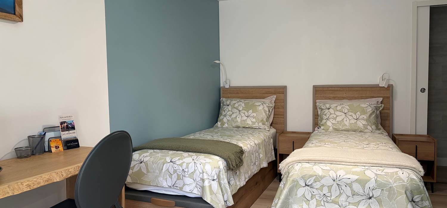 Chambre bleue lits séparés