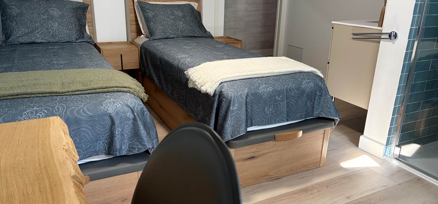 Chambre bleue lits séparés