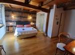 Chambre Terre — une ambiance douce et naturelle, inspirée des matières brutes et des couleurs minérales