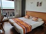 Chambre appartement 2 lits simples