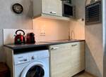 Appartement La Fabrique - La cuisine et la machine à laver