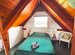 Chambre principale avec un lit double