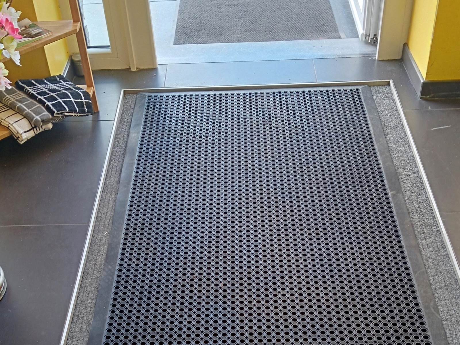 Passage de la rampe au hall d'entrée