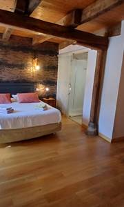 Chambre Terre — une ambiance douce et naturelle, inspirée des matières brutes et des couleurs minérales