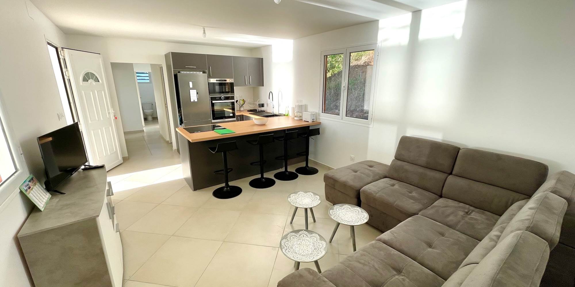 Espace salon avec TV