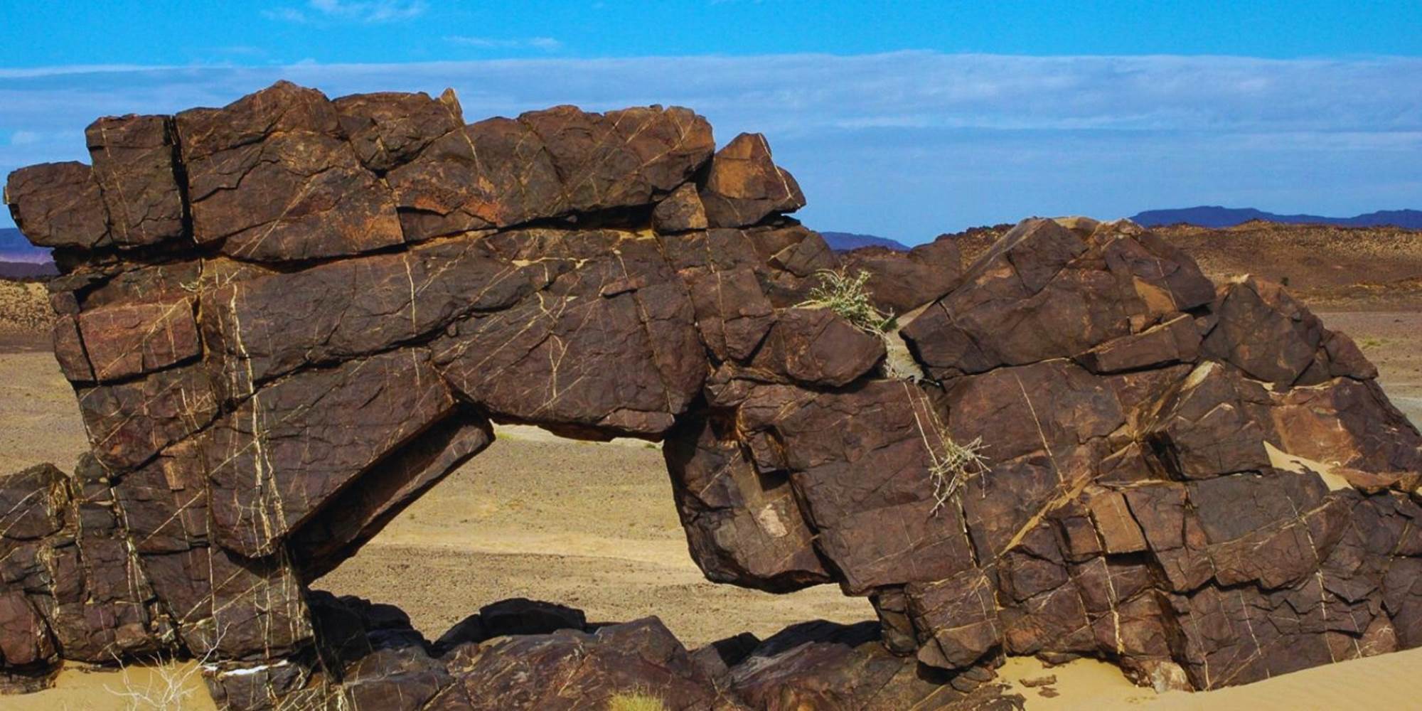Natural rock arch near Amerdoul Camping Hotel, Tata