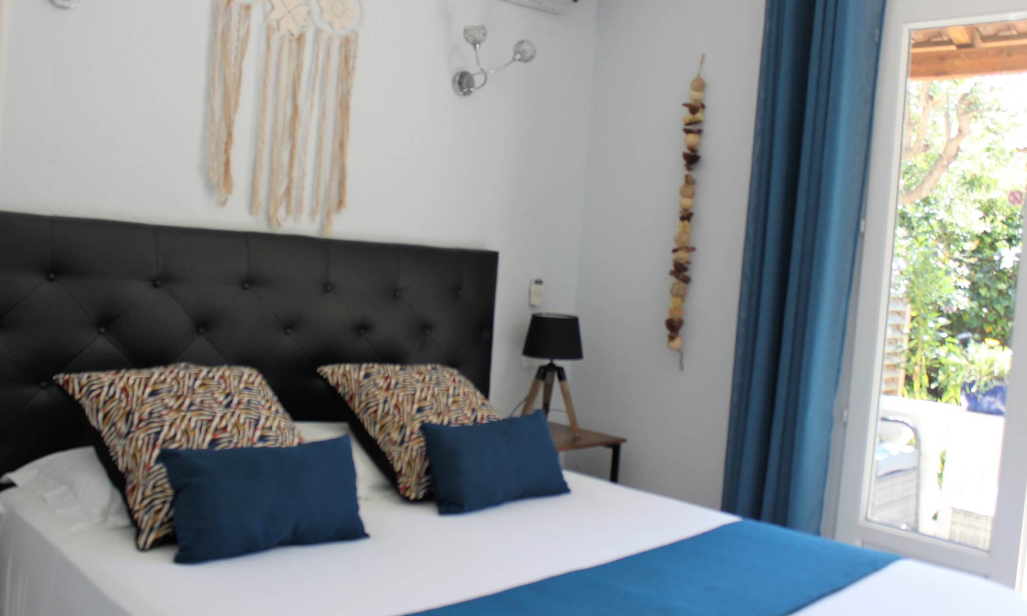 Chambre vue jardin appartement Saleccia