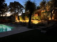 Villa Lou Pantaï pool and villa lit up at night, Côte d'Azur