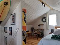 Chambre Suite lumineuse avec accès terrasse panoramique au Lodge de Plouarzel pour des vacances en couple en Bretagne