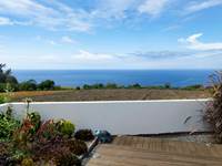 Terrasse avec vue océan.