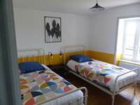 Chambre avec lit double du gîte de la Chevêche