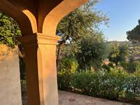 View from terrace over garden and Massif des Maures, Sainte-Maxime
