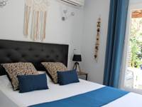 Chambre vue jardin appartement Saleccia