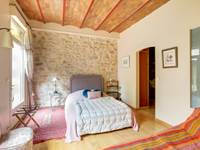Chambre mur en pierre