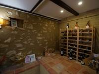 Cave à vin avec nos fleurs séchées