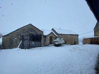 Maison sous la neige
