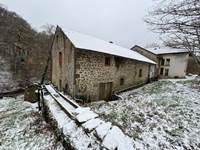 Le moulin et son amenée en hiver