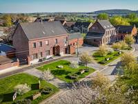 notre maison sur la place de Thimougies