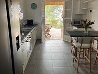Modern Kitchen with terrace and garden access, Villa Lou Pantaï