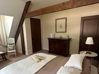 la chambre Lilas blanc avec lit bébé