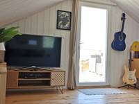 Chambre Suite avec salon musical et TV, accès terrasse panoramique