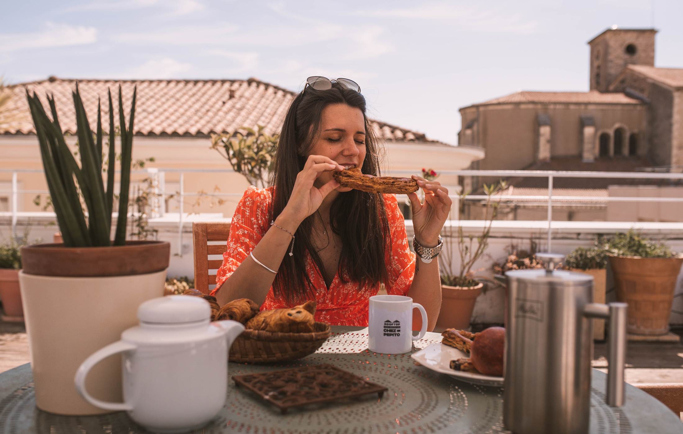 eating fougasse on the rooftop