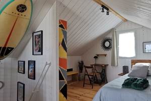 Chambre Suite lumineuse avec accès terrasse panoramique au Lodge de Plouarzel pour des vacances en couple en Bretagne