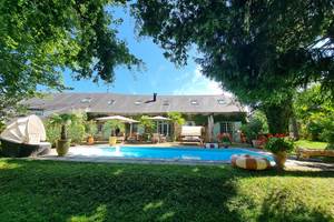 La Longère au bord de la piscine