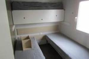 Chambre 2 des mobils homes Namasté et Nymphe 2 lits simples et 1 lit 140x 80