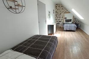 La chambre de droite à l'étage