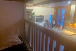 Lit juste au dessus de la cuisine