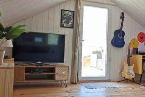 Chambre Suite avec salon musical et TV, accès terrasse panoramique