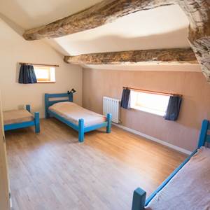La chambre avec 3 lits simples