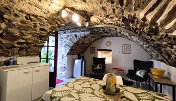 Cuisine et coin détente de la chambre de la Granhota-presta