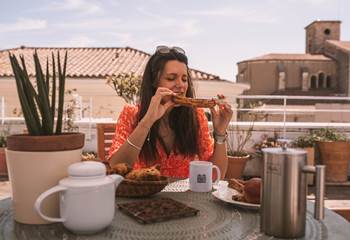eating fougasse on the rooftop