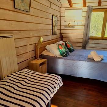 La chambre avec 2 lits-presta