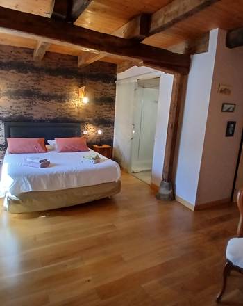 Chambre Terre — une ambiance douce et naturelle, inspirée des matières brutes et des couleurs minérales