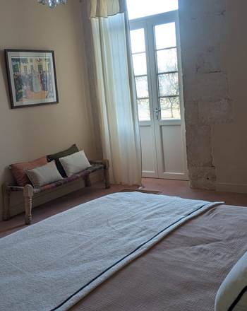 La chambre principale de la suite le Figuier
