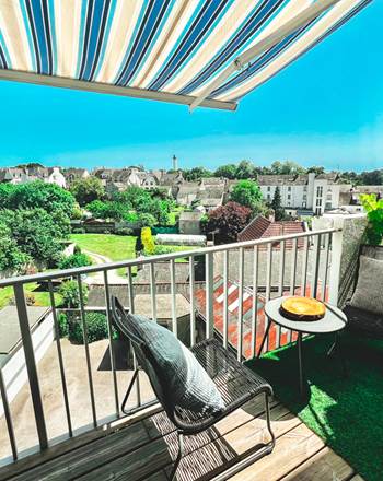 Balcon avec sur sur Bénodet et son phare