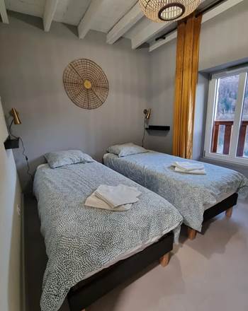 chambre avec 2 lits simples pouvant être rejoints en lit double