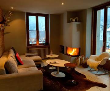 salon salle à manger  cheminée residence Bellevue Chamonix